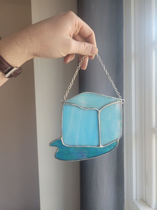 Ice Cube Being Melted by Saltshaker